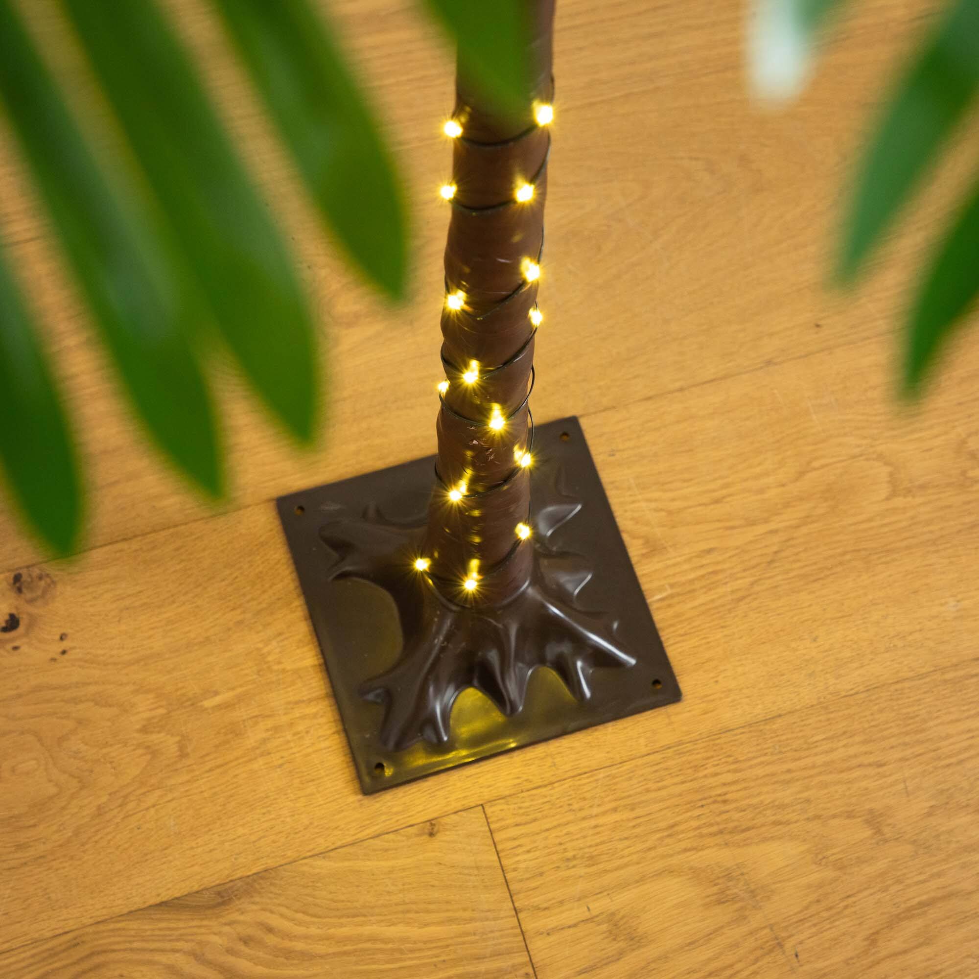 4ft. Pre-Lit UV Resistant Artificial Palm Tree with Warm White LED Lights